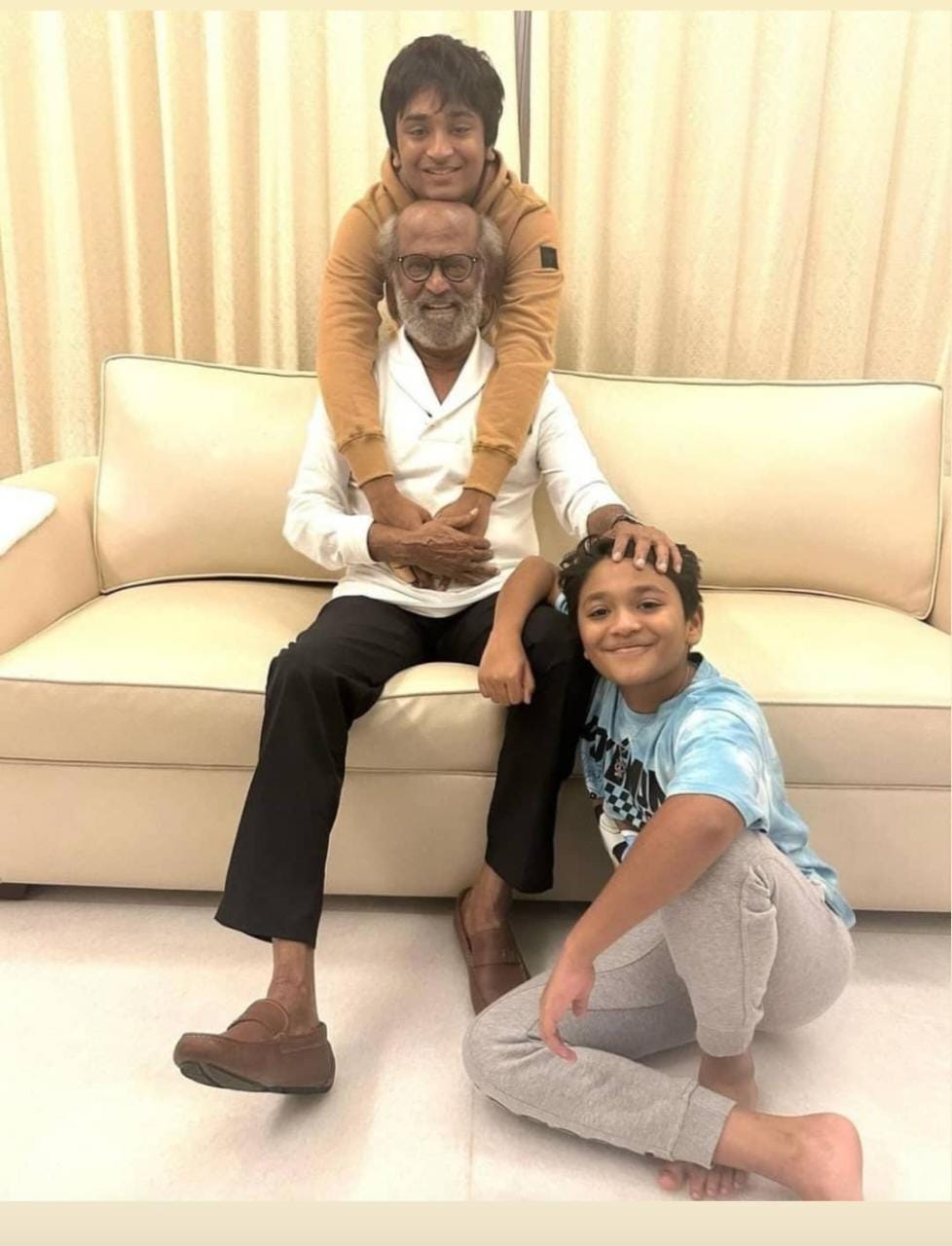 Birthday boy Rajinikanth with his grandchildren