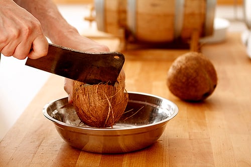 beating coconut